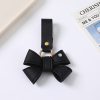 Nouveau porte-clés en cuir fait main avec nœud papillon, breloque de sac, pendentif de sac à dos, accessoire décoratif mignon, porte-clés en cuir papillon libellule