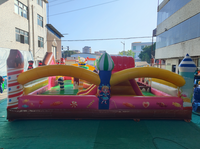 Château gonflable commercial pour événements, avec toboggan, parcours de roues et thème gâteau d'anniversaire, bonbons et anime, idéal pour location promotionnelle