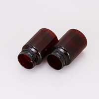 Bouteille en plastique PP solide vide ronde de 100 ml avec bouchon à rabat personnalisable avec impression de logo marron pour médicaments ou aliments