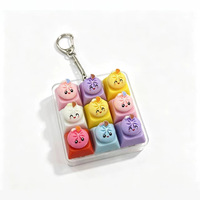 Porte-clés de clavier Halloween avec bouton de simulation de dumpling à visage souriant, jouet sensoriel à presser en forme de dumpling à neuf compartiments, pour sac à dos