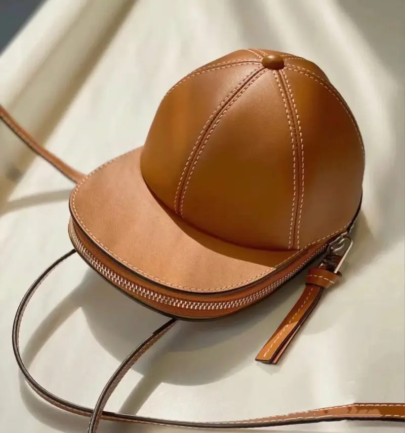 Modèles pour hommes et femmes en cuir de vachette fine casquette à la mode polyvalente épaule bandoulière chapeau de baseball sac sac de téléphone portable