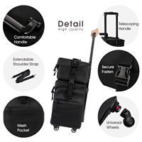 Valise de maquillage professionnelle noire à roulettes avec compartiment supérieur amovible 2 en 1, en nylon, avec roulettes