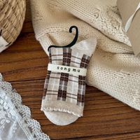 Chaussettes pour femmes préparées pour l'hiver, chaussettes chaudes en tricot à motif à pois pour la vente en gros