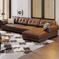 Canapé d'angle moderne en cuir marron avec chaise longue pour salon.