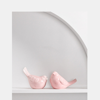 La populaire décoration d'oiseau en céramique inclinable rose d'Instagram