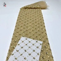 Tissu en dentelle brodée de trèfles à quatre feuilles, perles et paillettes pour costumes de scène, robe de mariée, tulle brodé à paillettes et perles