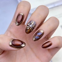 10 faux ongles à presser en amande brun ambre effet œil de chat, avec décorations 3D nœud perlé doré, réutilisables