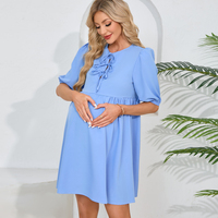 Robe de grossesse courte fluide à col rond uni, avec nœud frontal, manches bouffantes et taille empire ample – Vente en gros