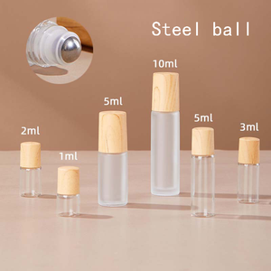 Rotolo di vetro portatile su bottiglia ricaricabile per olio essenziale con rullo inossidabile e fiala di profumo con coperchio in bambù - Product Image 3