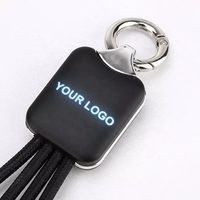 Cadeau promotionnel pour salon professionnel en gros : Porte-clés 3-en-1 avec câble de charge USB, lumière LED et logo, charge rapide 2A Max, compatible ordinateur