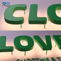 Enseigne rétroéclairée personnalisée, lettres en acier inoxydable peintes avec halo lumineux et supports, logo de devanture flottant et illuminé