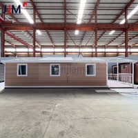 Maison préfabriquée de luxe à mur bleu JJM Australie Standard 20 pieds 30 pieds 40 pieds Conteneur extensible Maison Pliable Immeuble de bureaux en acier