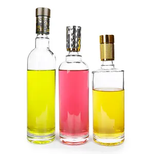 Luxury 500ml 16 OZ clear round glass bottle for tequila alcohol vodka with golden cap