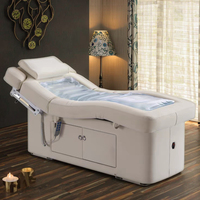 Table de massage électrique moderne personnalisée avec revêtement en cuir PU et fonction chauffante pour les soins de spa en hôtel