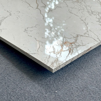 Carreaux de sol en porcelaine brillante effet marbre veiné or et gris, grand format 1200 x 600 (24x48), finition haute brillance, vente en gros