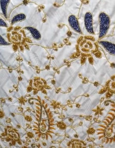 डुबाई एमड कपड़े बाजिन में बनाया गया है उसमें अद्वितीय पैटर्न बीज क्रीम कपास को बनाया गया है। - Product Image 1