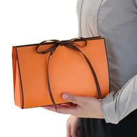 Groothandel Op Maat Logo Papieren Zak Met Strik Cadeau Sieraden Papieren Zak Met Strik Op Maat Gemaakte Papieren Verpakkingstassen