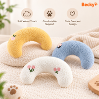 Coussin pour animaux de compagnie en tissu de velours rembourré de coton, durable, couleur personnalisée, doux, en forme de U, écologique, à motif uni, pour un sommeil profond