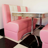Ensemble de banquettes de style restaurant américain rétro avec cuir rose et blanc et table chromée