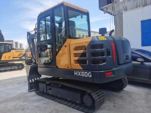 รถขุดขนาดเล็ก HX60G 6 ตัน พร้อมห้องโดยสารแบบปิด ระบบควบคุม PLC เกียร์ไฮดรอลิก ปั๊มไฮดรอลิก เครื่องยนต์ กำลังขุดสูง 1 - Product Image 1