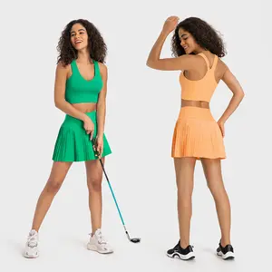 Özel Logo V boyun spor sutyen pilili Mini etek Golft tenis spor Yoga kıyafeti iki parçalı takım elbise seti kadınlar açık alan sporları giysi