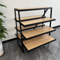 Modernes einfaches Eisen-Installations-Display-Gestell für die Landung des Bekleidungs geschäfts