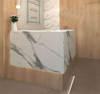 Bureau de réception moderne en marbre en forme de L unique avec finition or blanc pour bureau, hôtel, centre commercial et salon de beauté - Utilisation commerciale durable