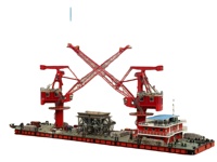 Une grue à portique fixe à flèche unique de 60 tonnes largement utilisée dans les ports, équipée d'un grappin et d'un engrenage de levage de conteneurs