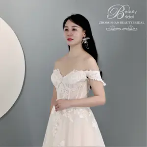 Robe de mariée à épaules dénudées de qualité robe de mariée élégante avec appliques de dentelle robe de mariée de luxe