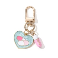 Pendentifs mignons en forme de flacon de médicaments en forme de cœur de dessin animé, porte-clés de la série Hôpital, pour amis, médecins, infirmières, bon cadeau, bijoux faits à la main