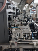 Machine d'impression sérigraphique automatique haute vitesse avec traitement UV par flamme pour bouteilles de boissons et pots de crème en plastique/verre multicolores