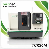 Tour CNC à banc incliné TCK36M, système GSK, tourelle motorisée 12 postes, mandrin hydraulique creux de 6 pouces, pour tournage de métaux