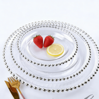 Assiettes de présentation en verre transparent de 13 pouces en forme de pétale avec bordure dorée ou argentée pour la décoration de tables de mariage, banquets et fêtes - Vente en gros