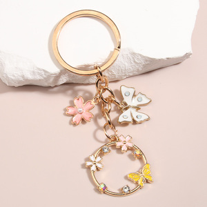 Lindo esmalte mariposa Sakura flor llavero hecho a mano aleación Zinc DIY joyería para mujeres niñas jardín llaveros amistad regalos - Product Image 2