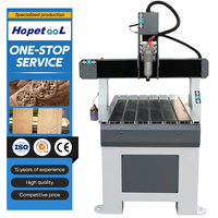 Router CNC 6090 dengan poros sekrup meja vakum poros berpendingin air mesin pemotong ukiran kayu akrilik presisi tinggi