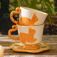Service à thé en céramique personnalisable sur le thème du chat avec théière à oreilles de chat, soucoupes à empreintes de pattes et tasses à motif de chat, idéal pour la maison et les cafés