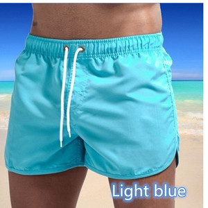 Shorts pour homme bleu clair à cordon de serrage en polyester, coupe sportive, pour l'été, la plage, l'entraînement, la course, séchage rapide, longueur courte, taille mi-haute - Product Image 1