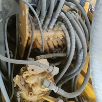 Excavatrice sur pneus Komatsu PW150-7 d'occasion, 15 tonnes, haute performance, engin de construction avec boîte de vitesses et pompe, prix avantageux