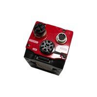 Lecteur de codes à barres bidimensionnels KEYENCE SR-2000W utilisé pour la lecture de codes sur plusieurs faces des boîtes en carton dans les lignes de tri