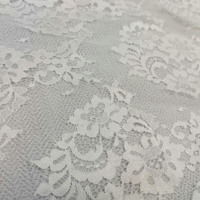Tissu de dentelle en nylon blanc 100% respirant et écologique tricoté léger pour robes de mariée élégantes et projets décoratifs