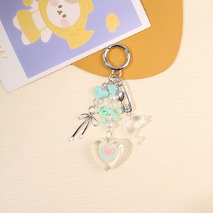 Porte-clés en alliage simple et élégant en forme de nœud, en résine tridimensionnelle en forme de cœur, pour téléphone portable ou sac - Product Image 3