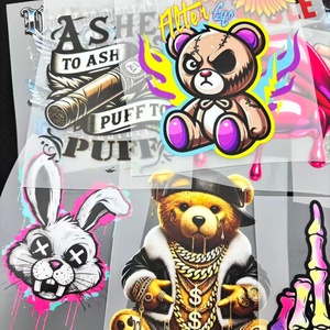 U.S. Spot Ready to Press Clothes Stickers Label <strong>Iron</strong> <strong>on</strong> Decals DTF <strong>Transfers</strong> for T Shirts Plastisol Heat Pet <strong>Transfer</strong> Printing - Product Image 3