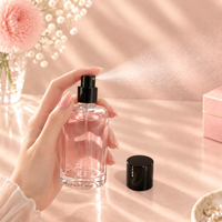 Vente en gros de flacons atomiseurs de parfum en verre transparent épais de 50 ml, design à épaule ronde, impression personnalisée pour l'emballage cosmétique