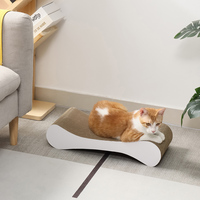 Griffoir pour chat en carton ondulé durable, forme d'os, avec motifs personnalisés et design mignon, vente en gros