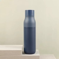 Tasse isolée en acier inoxydable 304 à la mode avec conception de bouteille de cola adaptée à une utilisation en voiture tasse cadeau de voyage sportif de grande capacité