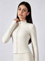 Nouvelle veste de yoga zippée courte pour femme, col montant, manches longues, coupe ajustée, avec trous pour les pouces, idéale pour la course et la gym, coupe-vent.