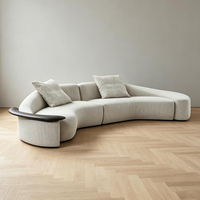 Canapé modulaire moderne en tissu incurvé rembourré de haute qualité, design haut de gamme pour salon et usage hôtelier
