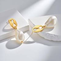 Boucles d'oreilles clous Gaovo au design minimaliste et irrégulier, imitation perle de café, en acier inoxydable doré, bijoux d'oreille tendance