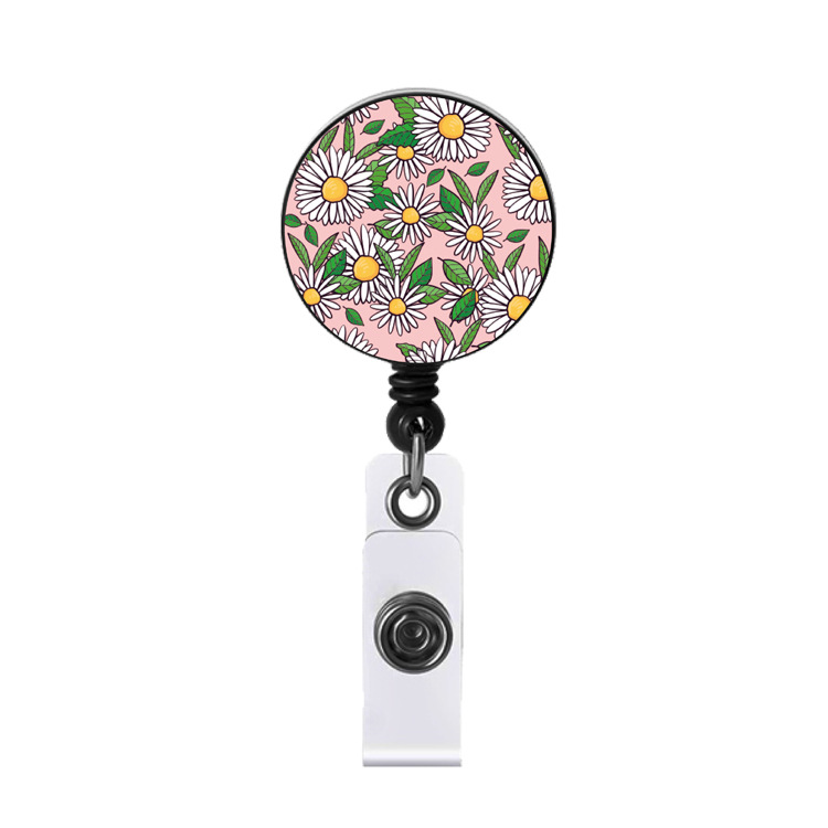 Badge marguerite fond rose