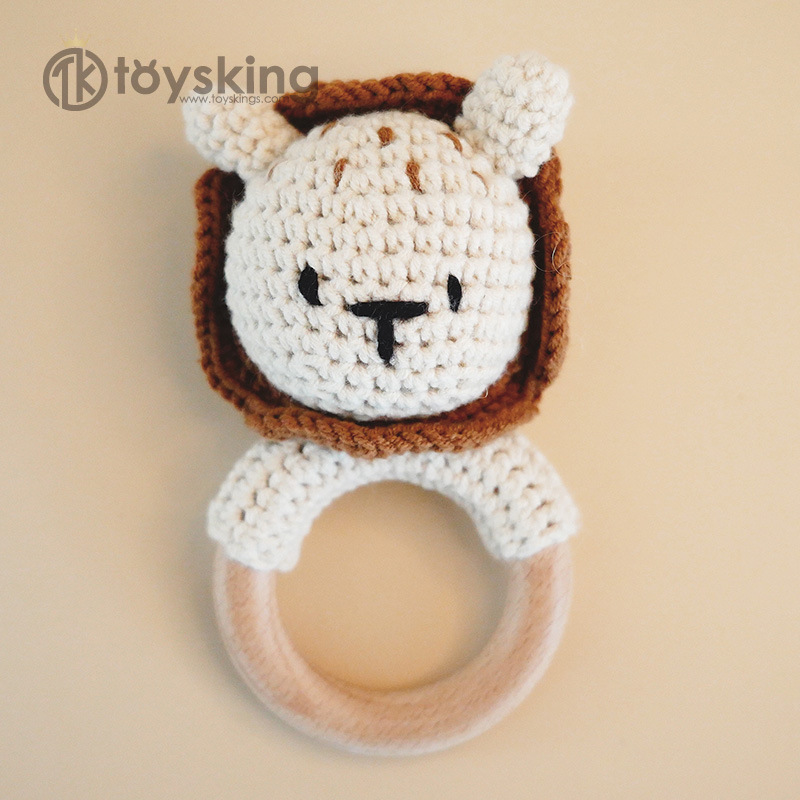 Campana de mano de león beige